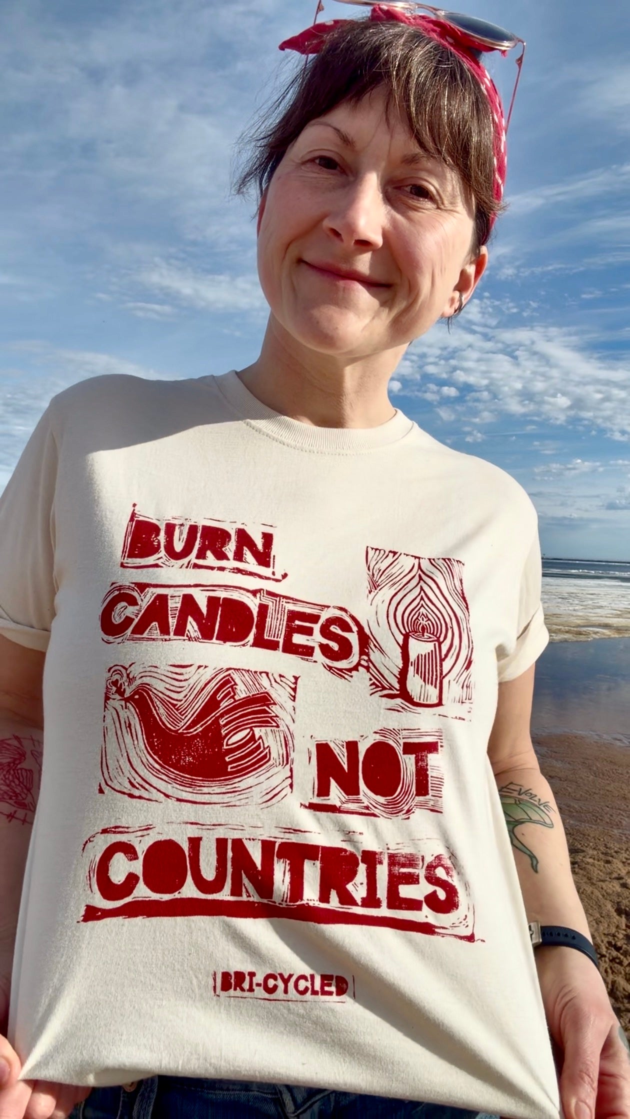 "Burn Candles, Not Countries" 100% Organic Cotton T-shirt