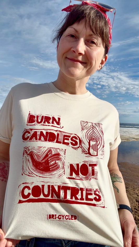 "Burn Candles, Not Countries" 100% Organic Cotton T-shirt